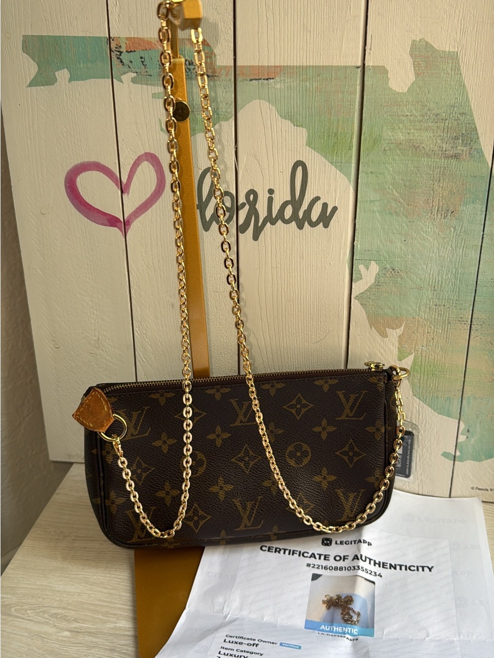 Louis Vuitton monogram Pochette bag with authenticated Felicie chain strap